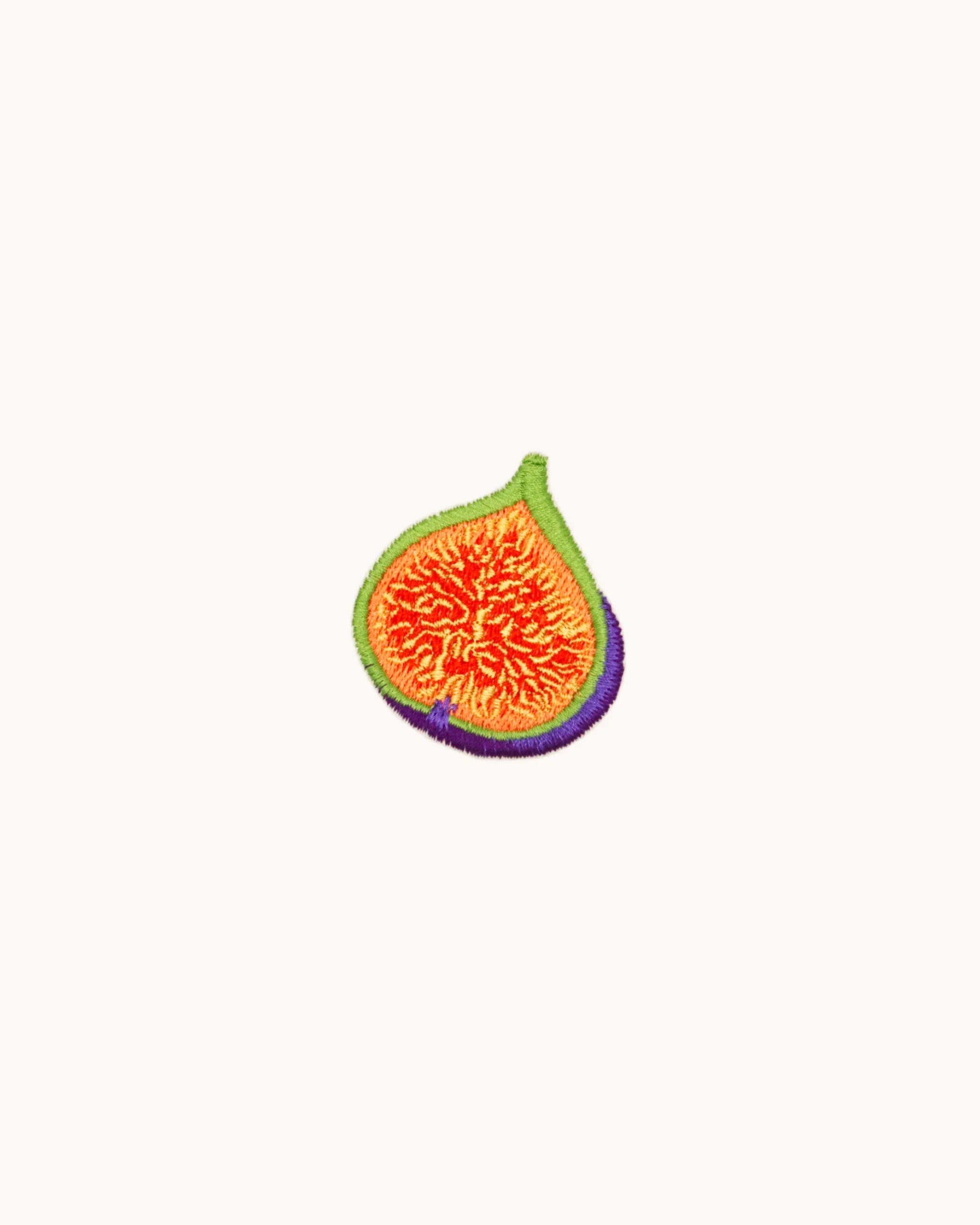Embroidered fig with a satin border and filled area